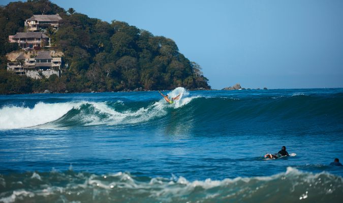 A Sayulita surfer takes on some larger waves