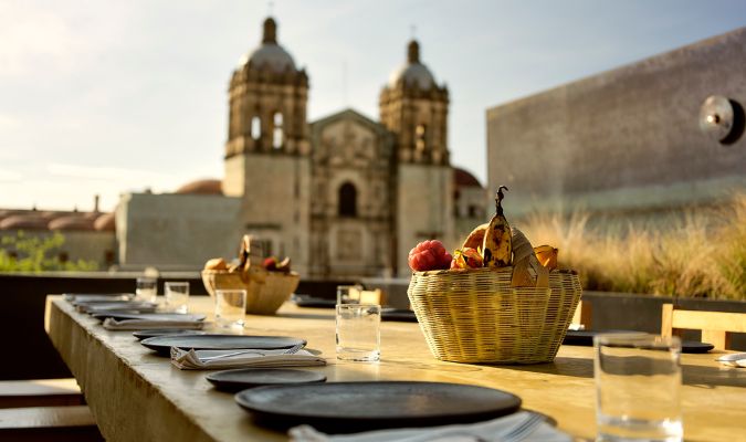otro oaxaca communal table view with food