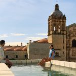 otro oaxaca couple enjoying pool