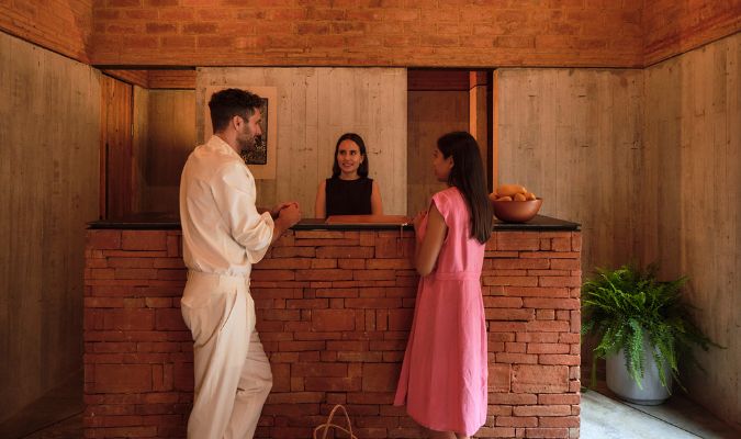 otro oaxaca front desk with couple