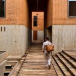 otro oaxaca man walking in hallway