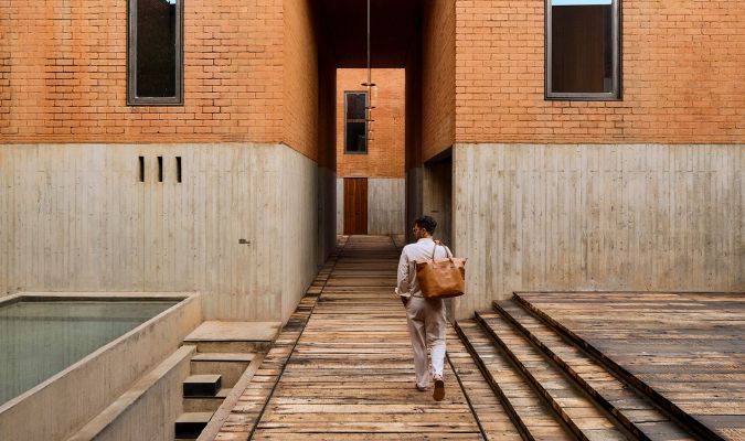 otro oaxaca man walking in hallway