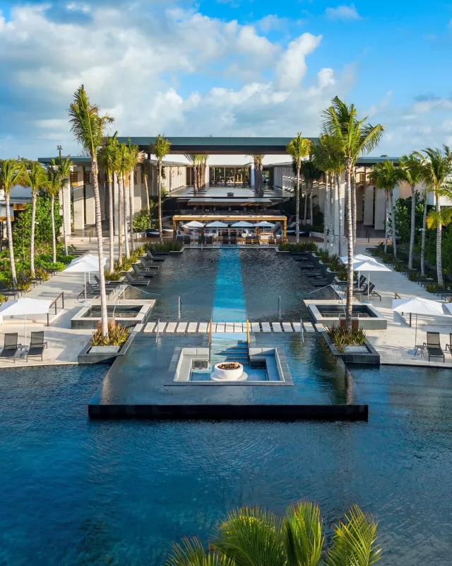 Stop looking—we’ve found your next dream stay in the Riviera Maya! @conradtulumrivieramaya combines lush nature with luxury. Think mangroves, white sand, and turquoise waters. 💭🌞✨

Just 45 minutes from the airport, it’s the perfect base for exploring ruins, cenotes, and jungles. With stunning rooms, amazing food, and a dreamy spa, it’s luxury with a local touch. 

Step into the open-air lobby, and you’ll know: vacation mode has officially begun. 🌴